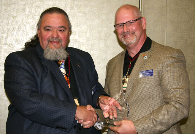 Presidential Award Ian Bennett, President, Royal Canadian Mint