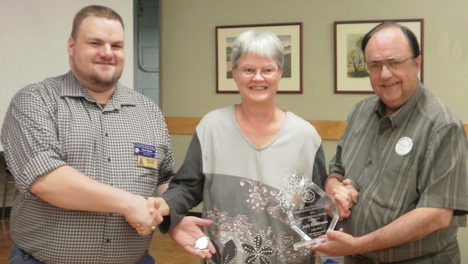 Judy Blackman receiving her Presidential Award